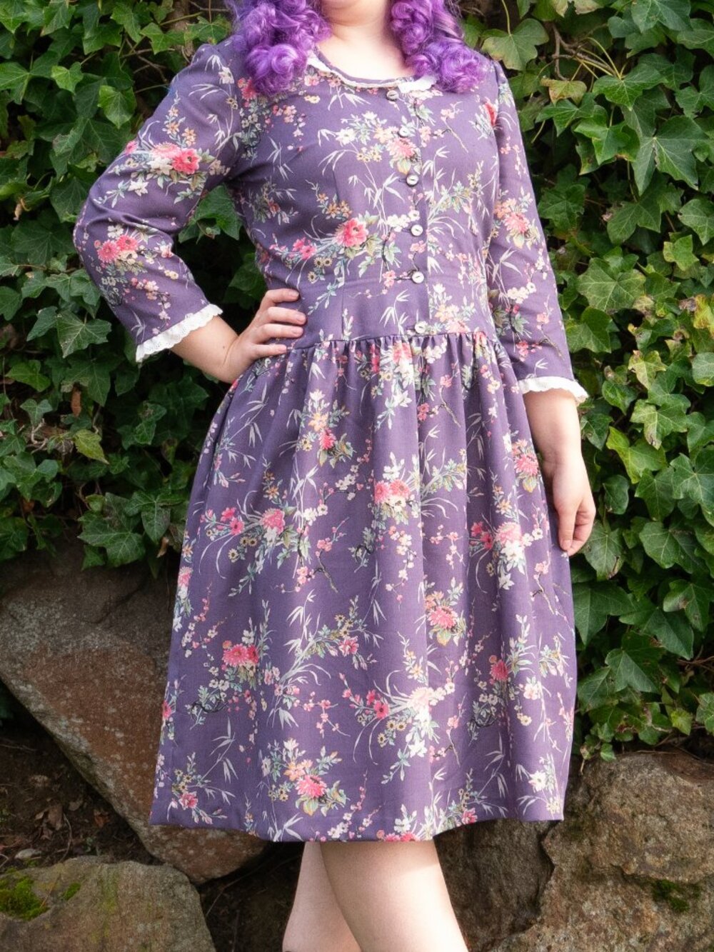 Vintage reproduction 1950s purple floral dress with pockets
